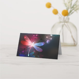 Glowing red dragonfly place card