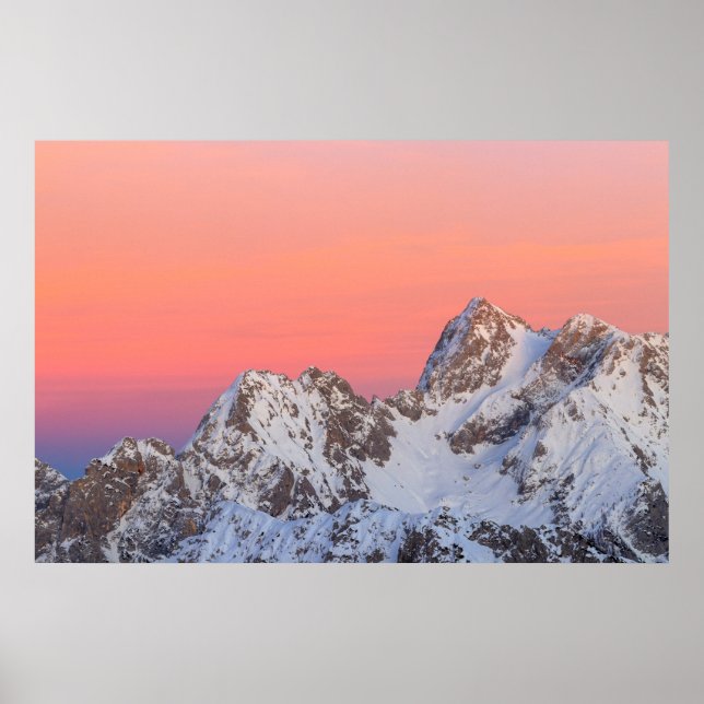 Glowing sunset sky and snowy mountains poster (Front)