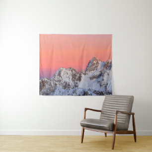Glowing sunset sky and snowy mountains tapestry