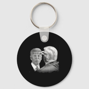 Go Brandon Trump Writes On Bidens Forehead  Key Ring