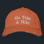 Go Take A Hike Outdoor Adventure  Embroidered Hat<br><div class="desc">This casual outdoor baseball cap features the phrase “Go Take A Hike” embroidered across the front in bold lettering. The warm rust-orange cap paired with simple white embroidery creates a clean and rugged outdoor style. The playful message celebrates hiking, nature, and time spent on the trail, making it perfect for...</div>
