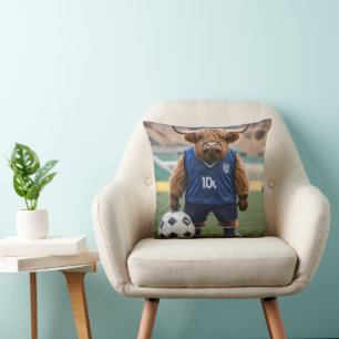 "Goal-Getter: A Highland Cow Dressed for Soccer" Cushion