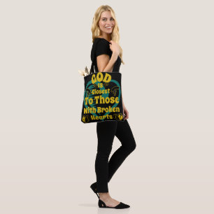 God is closest to those with broken hearts tote bag