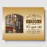 Gold 90th Birthday World’s Best Custom Photo Frame Guest Book<br><div class="desc">Celebrate the milestone birthday of your favourite senior citizen with this classy gift reminding them of how fabulous they are. Clean lines and tones of brown, gold and cream make up this simple yet elegant frame design that may be customised with your favourite photo, names, initials or other text. This...</div>