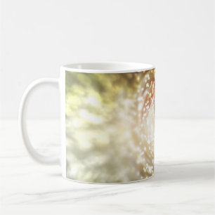 gold abstract blur background, with defocused boke coffee mug