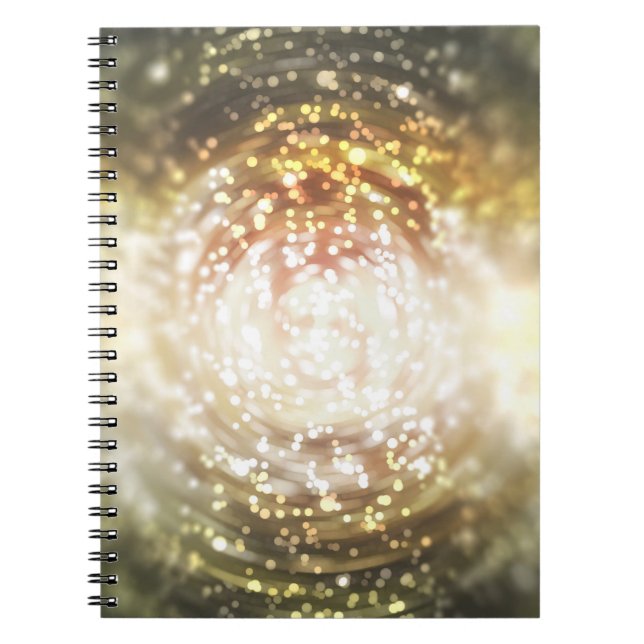 gold abstract blur background, with defocused boke notebook (Front)