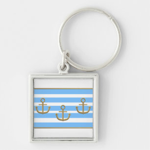 gold anchor blue white background key ring
