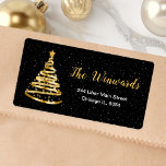 Gold and Black Ribbon Christmas Tree Label<br><div class="desc">This elegant and chic address label features a gold ribbon Christmas tree with a star topper. The text combines handwritten script and modern sans serif fonts for a classy and sophisticated look. The falling snow, snowflakes and sparkles give a festive and magical touch. This is perfect for Christmas and the...</div>