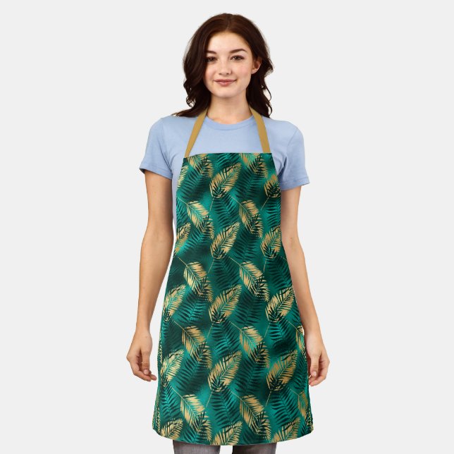 Gold and dark teal leaves on teal pattern apron (Worn)