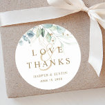 Gold and Green Botanical Wedding Thank You Classic Round Sticker<br><div class="desc">This wedding thank you sticker features painted watercolor eucalyptus,  botanical green and gold glitter leaves with gold script.</div>