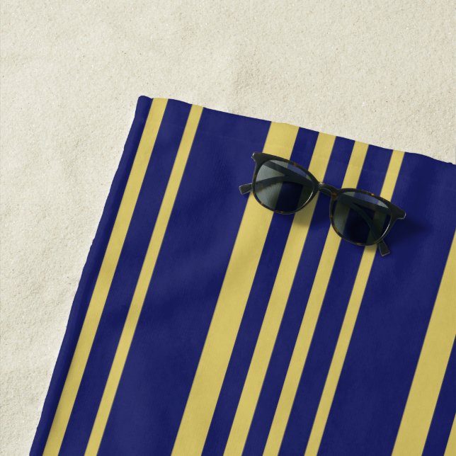 Gold and navy stripes patterned beach towel (In Situ)