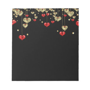 Gold and red hearts on black background notepad