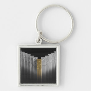 Gold and silver dominoes key ring