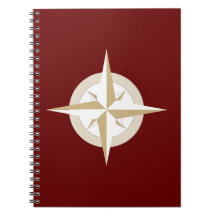 Gold and White Compass on Red