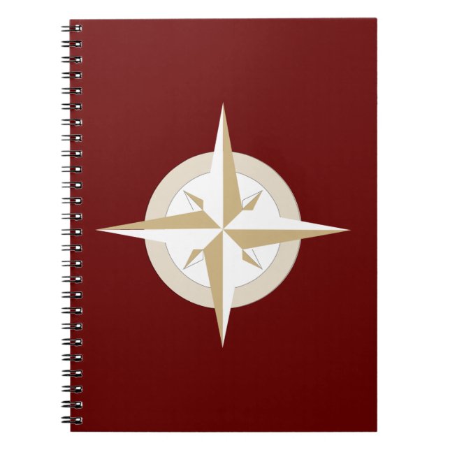 Gold and White Compass on Red Notebook (Front)