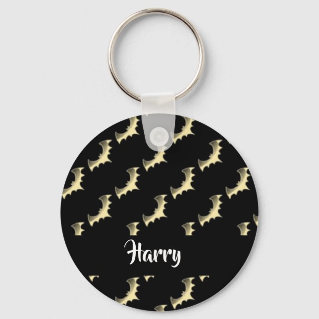 Gold bats on black key ring (Front)