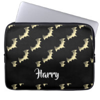 Gold bats on black