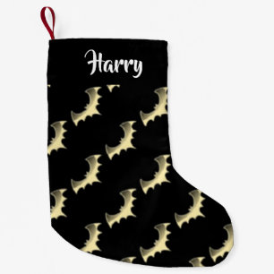 Gold bats on black small christmas stocking