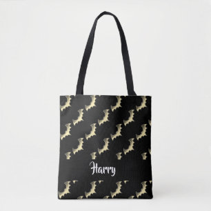 Gold bats on black tote bag