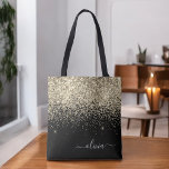 Gold Black Girly Glitter Sparkle Monogram Name Tote Bag<br><div class="desc">Black and Gold Faux Sparkle and Glitter Elegant Monogram Book Bag. This Book Bag can be customised to include your initial and first name and given as a gift for Christmas,  Sweet 16 Birthday,  Bridal Shower or a Wedding.</div>