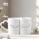 Gold Calligraphy Bride and Groom Newlyweds Coffee Mug Set<br><div class="desc">Custom-designed coffee/tea mug set for the bride and groom featuring gold glitter calligraphy and hearts with editable wedding date. This personalised mug set makes a memorable wedding gift for the newlyweds.</div>