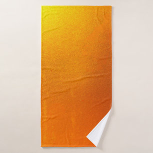 Gold color or foil on the wall texture background bath towel