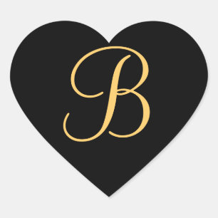 Gold-coloured initial B on black monogram sticker