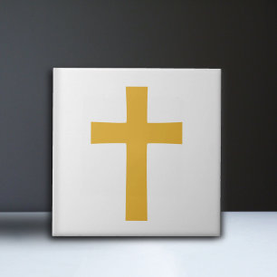 Gold Cross on White Ceramic Tile