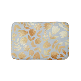 Gold flowers, blue background, foil imitation. bath mat