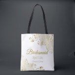 Gold Frills on White Elegant Bridesmaid Wedding Tote Bag<br><div class="desc">These Bridesmaid tote bags are designed as favours or gifts for wedding bridesmaids. Great swag bag to fill with favours and gifts. Coordinates with our Gold Foil Elegant Wedding Suite and is fully customisable. Simple design includes gold script text with a floral border over a white background. All text is...</div>
