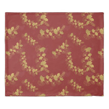 Gold Gingko Balboa Leaves on Dark Red Background