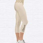 Gold Glitter Om Symbol High Waisted Capri Leggings<br><div class="desc">Gold Glitter Om symbol is tiled on the waistband, the capri leggings are pearl colour. Name in black on outside of right calf. Easily change or remove name using the Template provided. There is ample room for a full name or other text. Sizes from XS (0-2) to XL (16) I...</div>