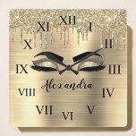 Gold Glitter Sparkle Eyelashes Monogram Name Square Wall Clock<br><div class="desc">Gold Faux Foil Metallic Sparkle Glitter Brushed Metal Monogram Name and Initial Eyelashes (Lashes),  Eyelash Extensions and Eyes cute wall clock. The design makes the perfect sweet 16 birthday,  wedding,  bridal shower,  anniversary,  baby shower or bachelorette party gift for someone looking for a trendy cool style.</div>