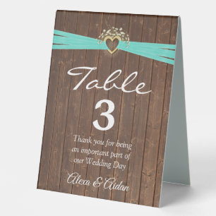 Gold Heart with Turquoise Ribbon On Wood