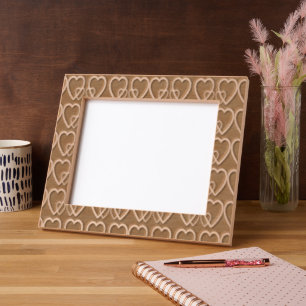 Gold hearts on maroon etched frames