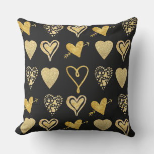 gold hearts pattern on black outdoor cushion