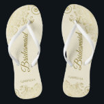 Gold Lace Elegant Ivory Cream Bridesmaid Wedding Thongs<br><div class="desc">These elegant wedding flip flops are a great way to thank and recognise your bridesmaids, while giving their feet a rest after a long day. The beautiful design features an elegant design with golden lace frills on an ivory or cream coloured background and fancy gold coloured script lettering. The text...</div>