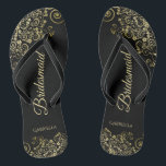 Gold Lace Frills Elegant Black Bridesmaid Wedding Thongs<br><div class="desc">These elegant wedding flip flops are a great way to thank and recognise your bridesmaids, while giving their feet a rest after a long day. The beautiful design features an elegant design with golden lace frills on a classic black background and fancy gold coloured script lettering. The text reads Bridesmaid...</div>