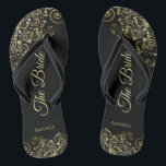 Gold Lace on Black The Bride Elegant Wedding Thongs<br><div class="desc">Dance the night away with these beautiful wedding flip flops. Designed for the bride, they feature a simple yet elegant design with gold coloured script lettering on a classic black background and fancy golden lace curls and swirls. Beautiful way to stay fancy and appropriate while giving your feet a break...</div>