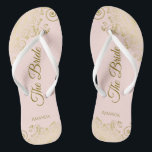 Gold Lace on Blush Pink The Bride Elegant Wedding Thongs<br><div class="desc">Dance the night away with these beautiful wedding flip flops. Designed for the bride, they feature a simple yet elegant design with gold coloured script lettering on a light blush pink background and fancy golden lace curls and swirls. Beautiful way to stay fancy and appropriate while giving your feet a...</div>