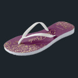 Gold Lace on Cassis Purple The Bride Wedding Thongs<br><div class="desc">Dance the night away with these beautiful wedding flip flops. Designed for the bride, they feature a simple yet elegant design with gold coloured script lettering on a cassis purple, magenta, or berry coloured background and fancy golden lace curls and swirls. Beautiful way to stay fancy and appropriate while giving...</div>
