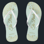 Gold Lace on Mint Green The Bride Elegant Wedding Thongs<br><div class="desc">Dance the night away with these beautiful wedding flip flops. Designed for the bride, they feature a simple yet elegant design with gold coloured script lettering on a light neo mint green coloured background and fancy golden lace curls and swirls. Beautiful way to stay fancy and appropriate while giving your...</div>