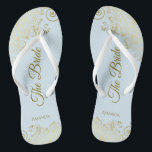 Gold Lace on Powder Blue The Bride Elegant Wedding Thongs<br><div class="desc">Dance the night away with these beautiful wedding flip flops. Designed for the bride, they feature a simple yet elegant design with gold coloured script lettering on a light powder blue background and fancy golden lace curls and swirls. Beautiful way to stay fancy and appropriate while giving your feet a...</div>