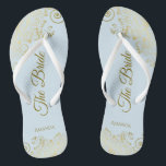Gold Lace on Powder Blue The Bride Elegant Wedding Thongs<br><div class="desc">Dance the night away with these beautiful wedding flip flops. Designed for the bride, they feature a simple yet elegant design with gold coloured script lettering on a light powder blue background and fancy golden lace curls and swirls. Beautiful way to stay fancy and appropriate while giving your feet a...</div>