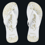 Gold Lace on White The Bride Elegant Wedding Thongs<br><div class="desc">Dance the night away with these beautiful wedding flip flops. Designed for the bride, they feature a simple yet elegant design with gold coloured script lettering on a white background and fancy golden lace curls and swirls. Beautiful way to stay fancy and appropriate while giving your feet a break after...</div>
