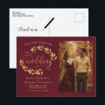 Gold Leaves Burgundy Wedding Save the Date Photo Announcement Postcard<br><div class="desc">This wedding Save the Date postcard is rustic, elegant, and beautiful. It features a hand painted watercolor design with sprigs of golden laurel leaves or vines and modern script lettering on a marbled burgundy background. There is space for your photo, the couple's name, and the wedding location. The back has...</div>