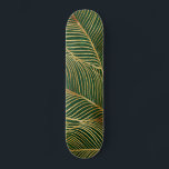 Gold Leaves Forest Green Elegant Pattern Skateboard<br><div class="desc">Modern luxury gold leaves drawing, filled with shimmering faux gold glitter sparkle plant leaves hand Drawn tropical design, creating an unusual gold foil exotic foliage pattern amazing tropic artwork, over a trendy velvety look forest green colour background. Stylish, chic fashionable contemporary art, yellow gold and emerald green colours paint nature...</div>