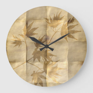 Gold maple leaves on parchment paper elegant large clock