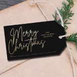 Gold Merry Christmas on Black Gift Tags<br><div class="desc">Merry Christmas in a chic faux gold foil script,  from with your names and a line for who the gift is to,  these black gift tags or party favour tags are stylish for any Christmas holiday occasion.</div>