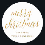 Gold Merry Christmas Personalised Holiday Sticker<br><div class="desc">Simple gold "merry christmas" script holiday stickers,  personalised with your family name. The script calligraphy is in a gold glitter effect (a printed effect,  not actual glitter).</div>